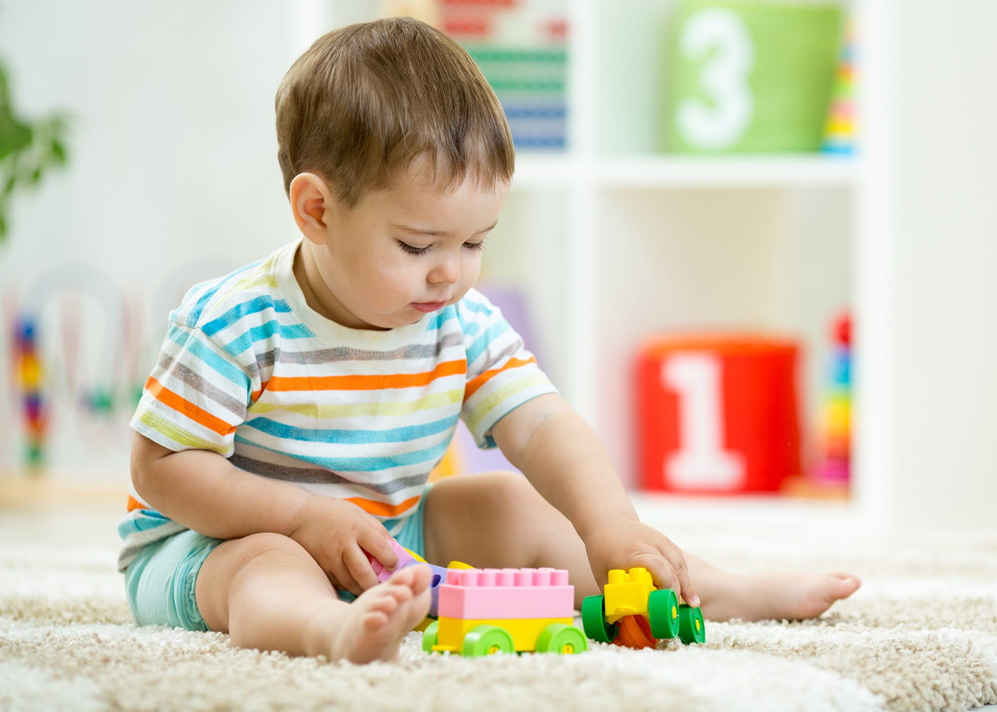 Child playing with toys