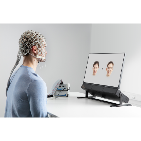 A person using Tobii Pro Spectrum and Brain Products to study emotions