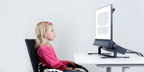 Girl reading on Tobii Pro Spectrum