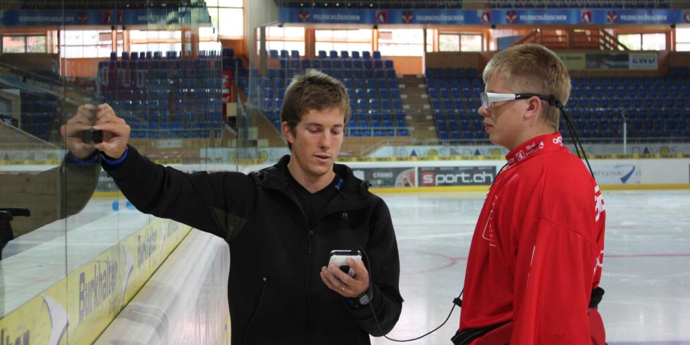 A calibration of Tobii Pro Glasses 1  at a hockey arena.