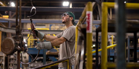 Man using wearable eye trackers in an industrial setting