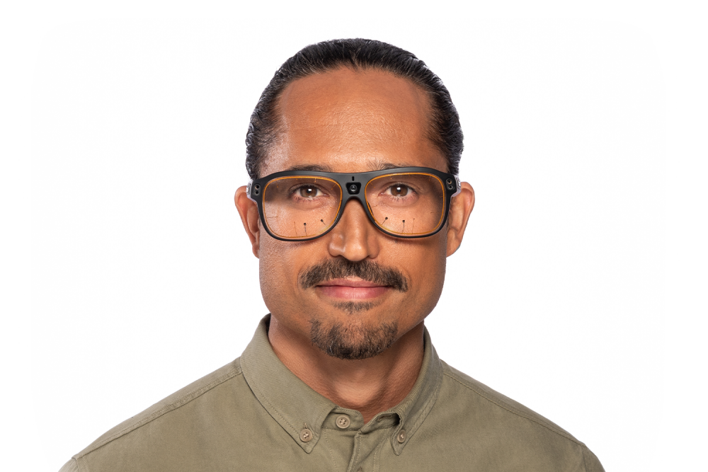 Head shot of a man with Tobii Pro Glasses 3