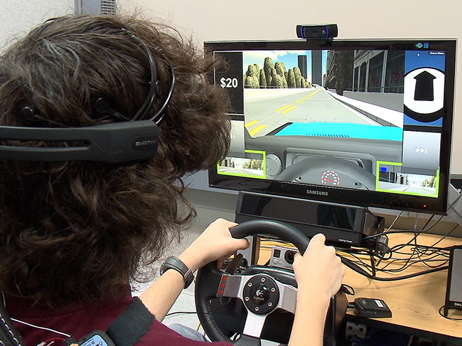  A Pilot Study Assessing Performance and Visual Attention of Teenagers with ASD in a Novel Adaptive Driving Simulator