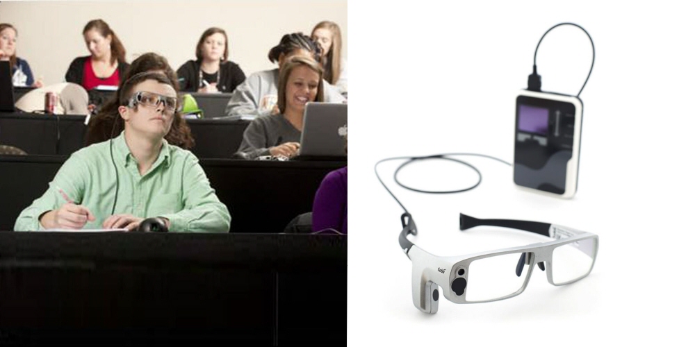 A student wearing Tobii Pro Glasses 1 and following the lecture.