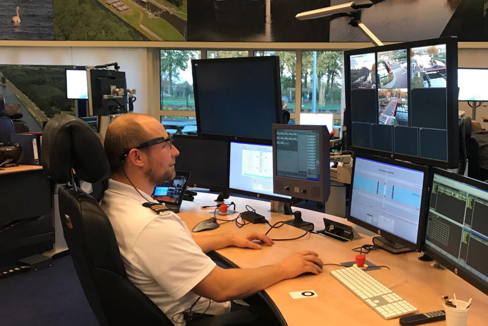 A bridge operator looking at screen using eye tracker glasses